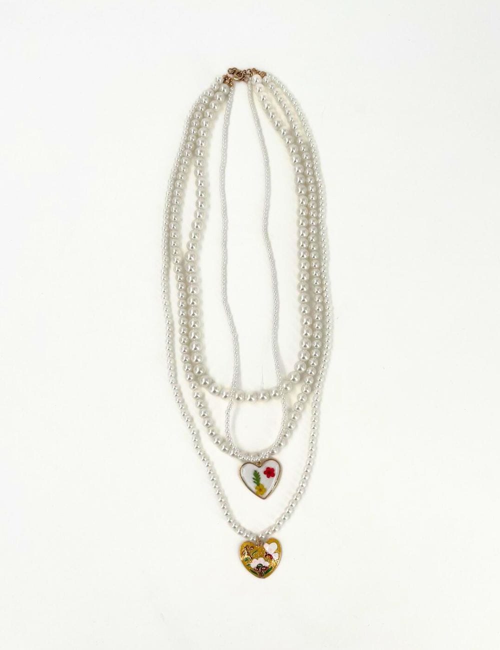 Collana perle con cuori pendenti